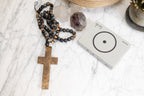 ***Cross on Antiqued Black Wood Bead Strand